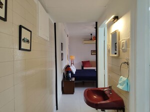 Living Room in 1 RK Apartment at Versova Sea Green Apartment, Andheri West – for Rent