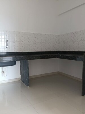 Kitchen in 2 BHK Apartment at Majestique Rhythm County, Handewadi – for Sale