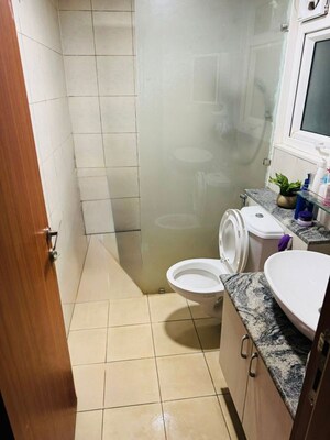 Bathroom in 3 BHK Apartment at Bhartiya City Nikoo Homes II, Thanisandra Main Road – for Sale