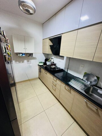 Kitchen in 3 BHK Apartment at Bhartiya City Nikoo Homes II, Thanisandra Main Road – for Sale