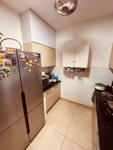 Kitchen in 3 BHK Apartment at Bhartiya City Nikoo Homes II, Thanisandra Main Road – for Sale