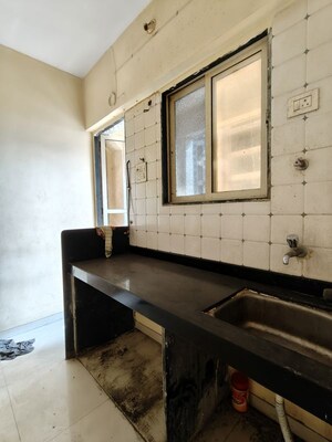 Kitchen in 1 BHK Apartment at Seven Apna Ghar Phase 2 Plot A, Mira Road – for Sale