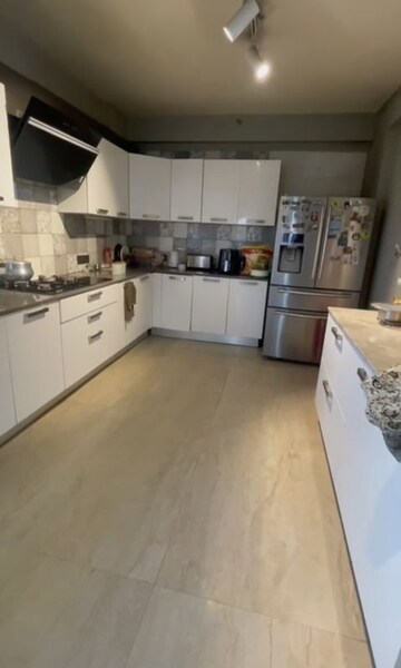 Kitchen in 4 BHK Apartment at Tata Raheja Raisina Residency, Sector 59 – for Rent