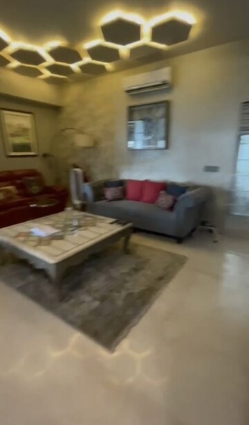 Living Room in 4 BHK Apartment at Tata Raheja Raisina Residency, Sector 59 – for Rent