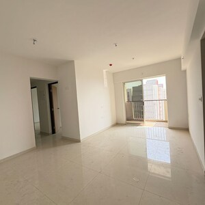 Living Room in 3 BHK Apartment at Lodha Codename Premier, Mangaon – for Sale