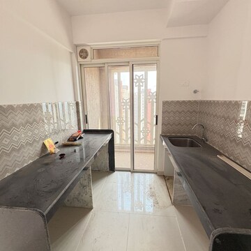 Kitchen in 3 BHK Apartment at Lodha Codename Premier, Mangaon – for Sale