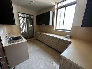 Kitchen in 3 BHK Apartment at Piramal Vaikunth, Balkum Pada – for Rent