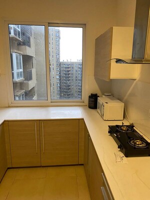 Kitchen in 3.5 BHK Apartment at Bhartiya Nikoo Homes, Thanisandra Main Road – for Sale