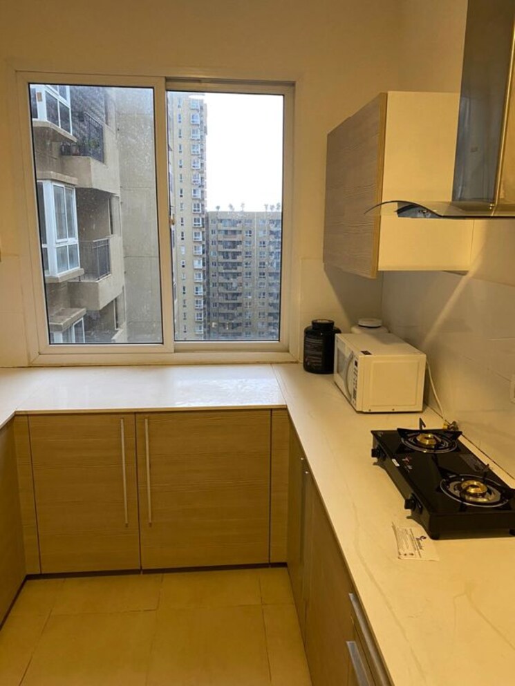 Kitchen, bhartiya-nikoo-homes 3.5 Bedroom 1917 Sq.Ft. Apartment In Thanisandra Main Road Bangalore 9956186