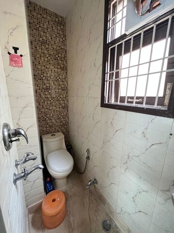 Bathroom in 2 BHK Builder Floor at Kalkaji – for Rent