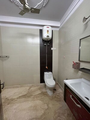 Bathroom in 2 BHK Builder Floor at Kalkaji – for Rent