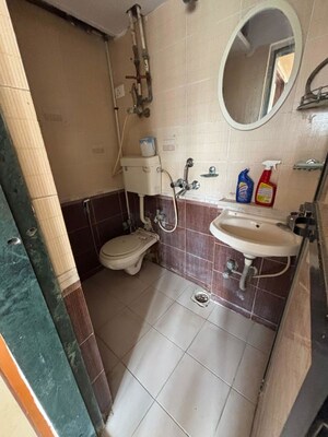 Bathroom in 2 BHK Apartment at N G Park, Dahisar East – for Sale