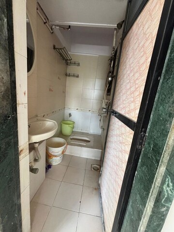 Bathroom in 2 BHK Apartment at N G Park, Dahisar East – for Sale