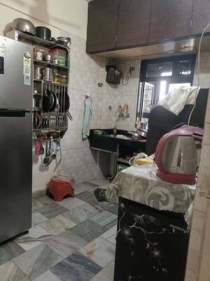 Kitchen in 1 BHK Apartment at Vraj Apartments, Dahisar East – for Sale