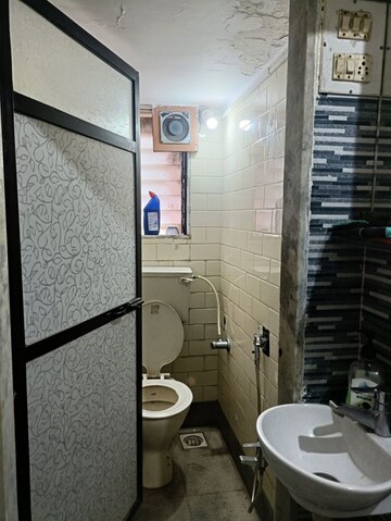 Bathroom in 1 BHK Apartment at Vraj Apartments, Dahisar East – for Sale