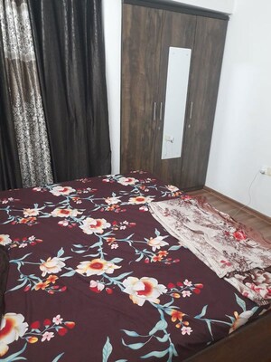 Bedroom in 2 BHK Apartment at Lodha Palava City, Dombivli East – for Rent