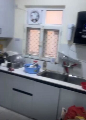 Kitchen in 3 BHK Apartment at Uninav Eden, Raj Nagar Extension – for Sale