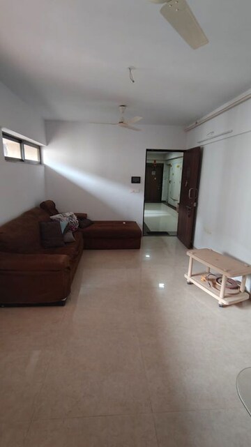 Living Room in 1 BHK Apartment at Lodha Palava City, Dombivli East – for Sale