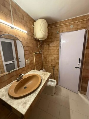 Bathroom in 2 BHK Builder Floor at Nehru Enclave – for Rent