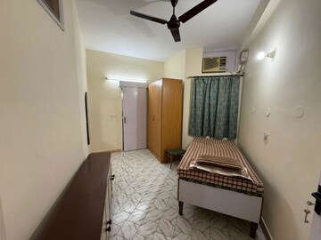 Bedroom in 2 BHK Builder Floor at Nehru Enclave – for Rent