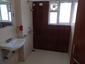 Bathroom in 3 BHK Apartment at Akash Enclave, Vrindavan Yojna – for Sale