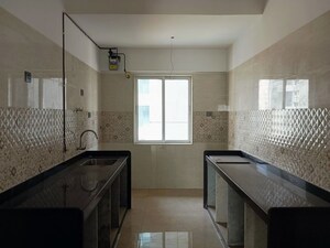 Kitchen in 2 BHK Apartment at Shivaji Park – for Sale