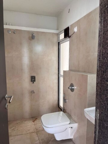Bathroom in 1 BHK Apartment at Puranik City Reserva, Ghodbunder Road – for Rent
