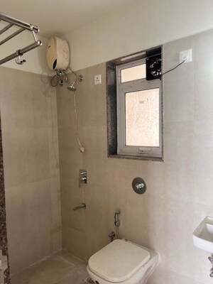 Bathroom in 1 BHK Apartment at Puranik City Reserva, Ghodbunder Road – for Rent