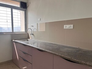 Kitchen in 1 BHK Apartment at Puranik City Reserva, Ghodbunder Road – for Rent