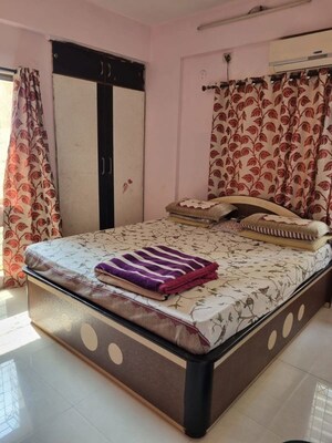 Bedroom in 2 BHK Apartment at Vijay Enclave, Waghbil – for Rent