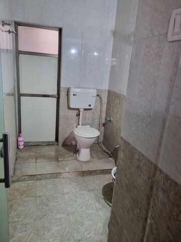 Bathroom in 2 BHK Apartment at Vijay Enclave, Waghbil – for Rent