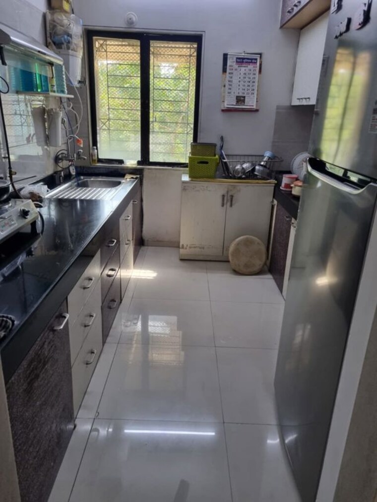 Kitchen, vijay-enclave 2 Bedroom 750 Sq.Ft. Apartment In Waghbil Thane 9956583