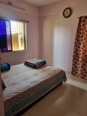 Living Room in 2 BHK Apartment at Vijay Enclave, Waghbil – for Rent