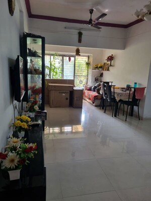 Living Room in 2 BHK Apartment at Vijay Enclave, Waghbil – for Rent