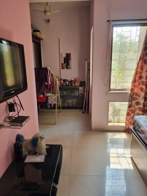 Living Room in 2 BHK Apartment at Vijay Enclave, Waghbil – for Rent