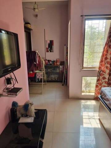 Living Room in 2 BHK Apartment at Vijay Enclave, Waghbil – for Rent