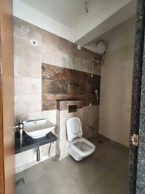 Bathroom in 2 BHK Apartment at Naman Habitat, Andheri West – for Sale