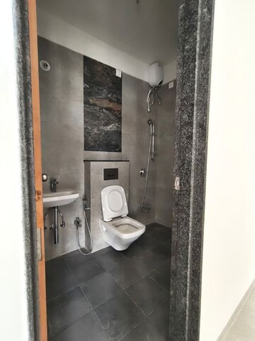 Bathroom in 2 BHK Apartment at Naman Habitat, Andheri West – for Sale