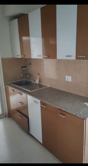 Kitchen in 2 BHK Apartment at Pardos Okas Residency, Sushant Golf City – for Rent