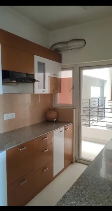 Kitchen in 2 BHK Apartment at Pardos Okas Residency, Sushant Golf City – for Rent
