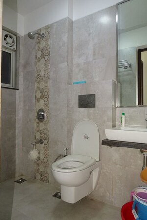 Bathroom in 3 BHK Apartment at Omkar Alta Monte, Malad East – for Rent