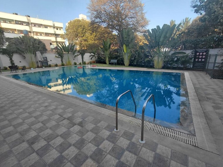 Swimming Pool, surbacon-cedar 2 Bedroom 1155 Sq.Ft. Apartment In Electronic City Phase ii Bangalore 9956759