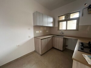 Kitchen in 2 BHK Apartment at Hiranandani Estate Rodas Enclave, Ghodbunder Road – for Rent