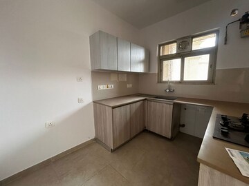 Kitchen in 2 BHK Apartment at Hiranandani Estate Rodas Enclave, Ghodbunder Road – for Rent