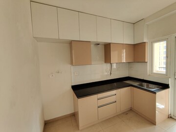 Kitchen in 2 BHK Apartment at Bhartiya Nikoo Homes Phase 2, Thanisandra Main Road – for Rent