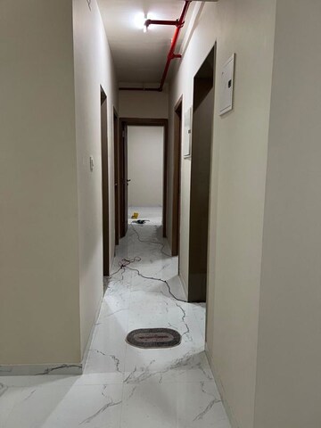 Building Lobby in 2.5 BHK Apartment at JP North Barcelona, Mira Road – for Rent