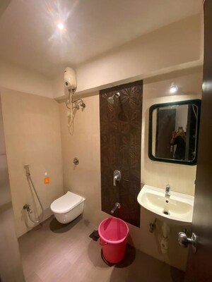 Bathroom in 2 BHK Apartment at Kamanwala Manavstal, Malad West – for Rent