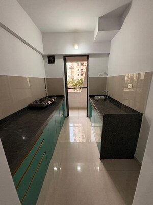 Kitchen in 1 BHK Apartment at Lodha Palava City Lakeshore Greens, Hedutane – for Sale