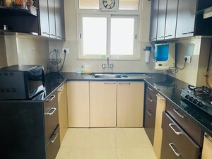 Kitchen in 3 BHK Apartment at Hiranandani Tribeca, Ghodbunder Road – for Rent