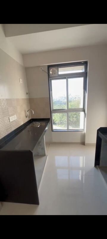 Kitchen in 2 BHK Apartment at Sanghvi S3 Skygreens, Mira Road – for Sale